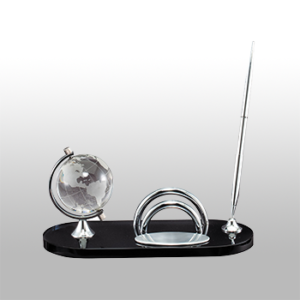 Desk Sign Set Including Pen Name Tag and Smoked Glass Globe On a Grey Gradient Background